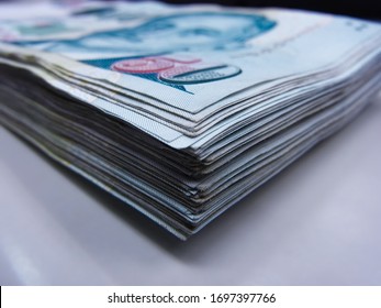 Close Up Of Stack Of Singapore Currency; Fifty Dollar Notes