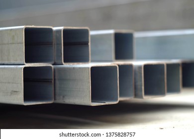 Close Up Stack Of Square Steel Tube For Industry, Industrial Business Technology Concept