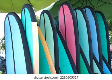 Close up of stack of surfing board in the beach