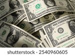 Close up of a stack of US one dollar bills. Background with dollars.