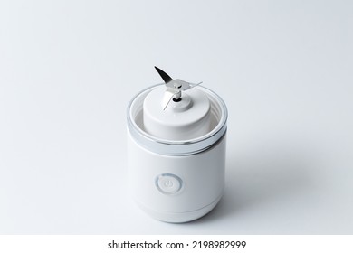 Close Up Of Stainless Steel Blades Of Portable Mini Blender For Making Smoothie Isolated On White Background.