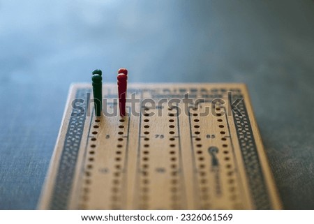 Close up of start pegs on cribbage board