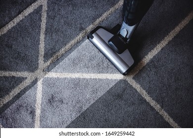 Close Up Of Steam Cleaner Cleaning Very Dirty Carpet.