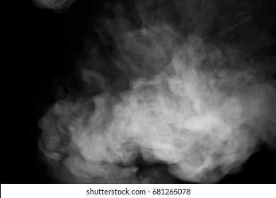 close up of steam smoke on black background - Shutterstock ID 681265078