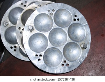 Close Up Of Steel Steamer Or Idli Maker Isolated On White Used To Make Popular  Indian Snack.