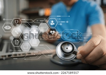 Close up of a stethoscope and digital tablet with virtual electronic medical record of patient on interface.Digital healthcare and network on modern virtual screen, medical technology.