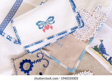 Close Up Of Stitch Cloth Heart Shape And Bow On White Fabric, Napkin. Handmade Favorite Hobby Or Handcraft, Baby Patchwork