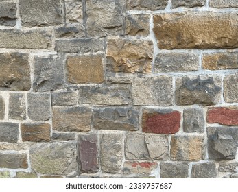 Close Up Stone Wall Texture with big bricks on ancient historic church in Germany, Europe. Can be used as a texture or background. Handcrafted old wall. Medieval. no2