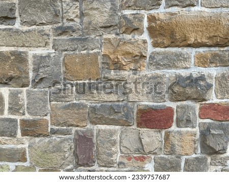 Close Up Stone Wall Texture with big bricks on ancient historic church in Germany, Europe. Can be used as a texture or background. Handcrafted old wall. Medieval. no2