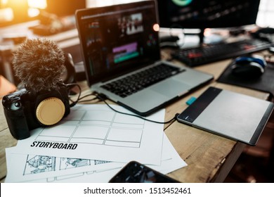 Close up storyboard content planning of production media of the Blogger or Vlog and the laptop and camera on the desk work - Shutterstock ID 1513452461