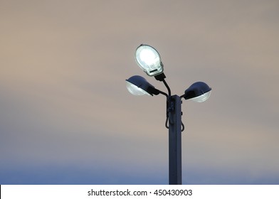 Close Up Of Street Lamp With Light