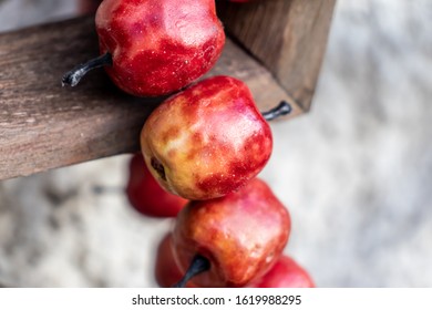 A Close Up Of A String Of Apple Popcorn Garland As A Holiday Decoration Outside A House In Cher-Mignon D'en Haut, Switzerland