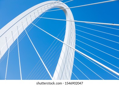 Close up of the structural lines of the bridge under the blue sky
