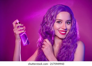 Close up studio photo of funny pretty theme party anime lady with wavy elven hair fixing hairdo over lilac background - Shutterstock ID 2175949943