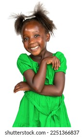 Close up studio portrait of cute little African girl in a green dress. Isolated on white background.
