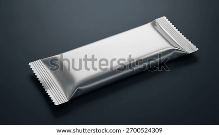 a close up studio shot shows a silver foil packaging mockup, perfect for showcasing snack bar, candy bar, protein bar, or chocolate bar designs on a dark background.