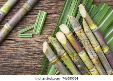 Close up sugarcane on wood background.Top view