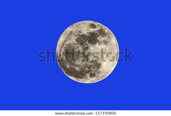 Close up of a super moon on blue\
background,Moon at largest also called\
supermoon.