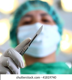 Close Up Of A Surgeon With A Surgical Knife