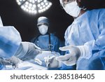 Close up of surgery team operating in modern hospital. Medical workers teamwork, saving rescuing patient`s life during plastic cardio surgery. Organs transplantation