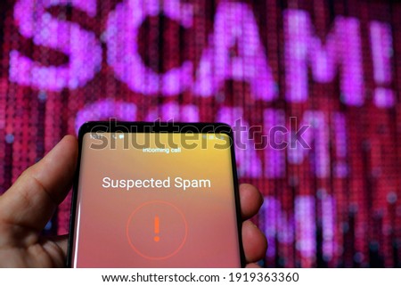 Close up Suspected Spam call on a smartphone. Cybercriminals preying on online users.