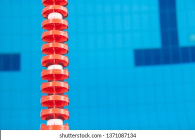 Close Up Of Swim Lane In Swimming Pool. Plastic Swimming Pool Floating Wave-breaking Lane