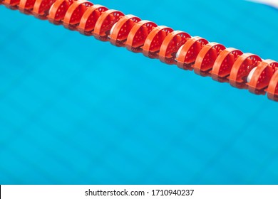 Close Up Of Swim Lane In Swimming Pool. Plastic Swimming Pool Floating Wave-breaking Lane