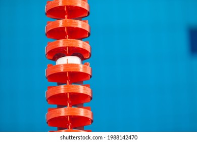 Close Up Of Swim Lane In Swimming Pool. Plastic Swimming Pool Floating Wave-breaking Lane