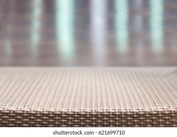 Close Up Table Top Rattan Table And Blur Background 