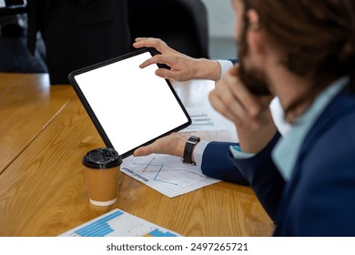 Close up Tablet empty white screen. business people meeting holding tablet mockup for marketing add message and product advertisement. Laptop display monitor blank.