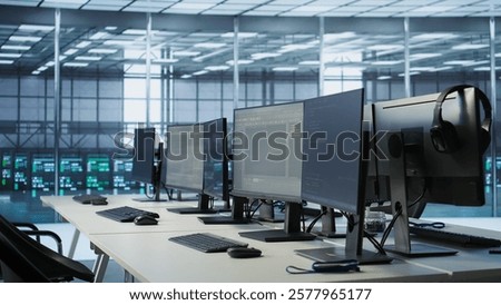 Close up of tablet in high tech data center business used for maintaining network gear. Focus on programming app on device in server farm used to ensure optimal system performance