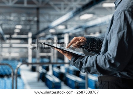 Close up of tablet used by data center technician to manage software updates for system stability. Server room IT expert optimizing performance with device, configuring infrastructure