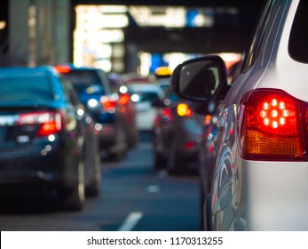 Close Up Of Tail Light Of A Car Waiting In Long Queue Of Traffic. Stopped Car With Its Brake Lights On In The City Of Melbourne, Australia.