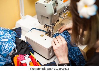 close up Tailoring Process - Women's hands behind her sewing