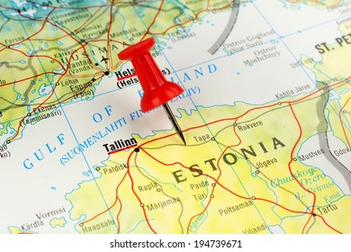 Close up of Tallinn Estonia on a map with red pin