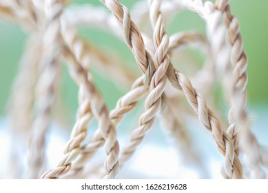 Close up Tangled Strings on Green Background. The crossroads of life image.