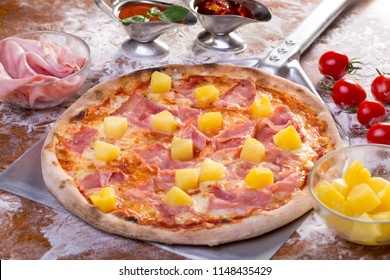 Close Up Of Tasty Hawaian Ham And Apple Pizza With Ingredients