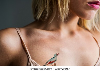 Close Up Of Tattoo On The Chest Of A Woman