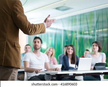 close up of teacher hand with marker while teaching lessons in school  classroom to students - Shutterstock ID 416890603