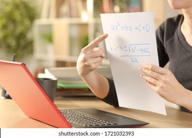 Close Up Of Teacher Woman Hands Teaching Online Lesson With Laptop On Videocall Stting On A Desk At Home