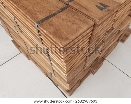 Close up​ of​ teak timber stack to made interior floor, Thailand 