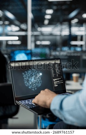Close up of technician in data center using AI LLM assistant on laptop to perform maintenance on hardware rigs. Server farm IT specialist using large language model chatbot on notebook to do backups
