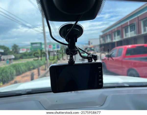 Close up Technician Hand\
with Car Camera and Smartphone Inside Car , 8 July 2022, Buriram\
province.