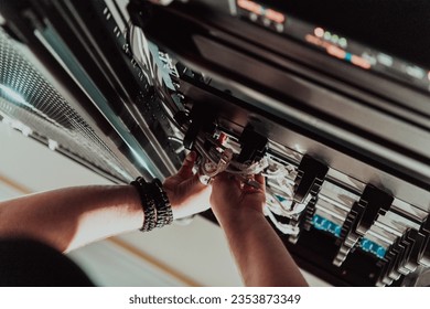 Close up of technician setting up network in server room 