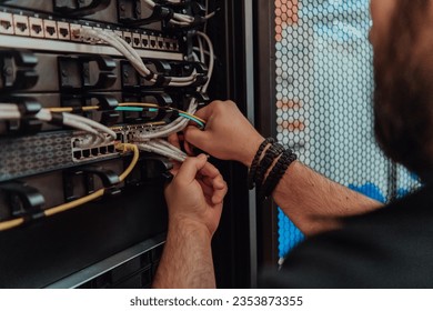 Close up of technician setting up network in server room  - Powered by Shutterstock