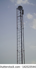 Close Up Of A Telecommunication Monopole Tower Structure Fitted With Omni Directional Antenna
