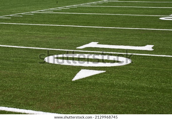 close up of the ten yard line in a football\
field - ten 10 wallpaper\
background