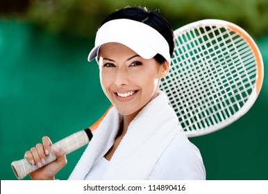 Close Up Of Tennis Player With Towel On Her Shoulders