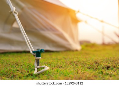 Close up of tent peg anchor on the ground   tent,hook of tent,camping