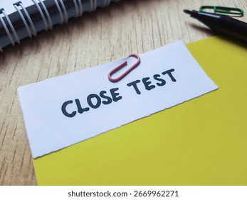 Close test writting on table background.